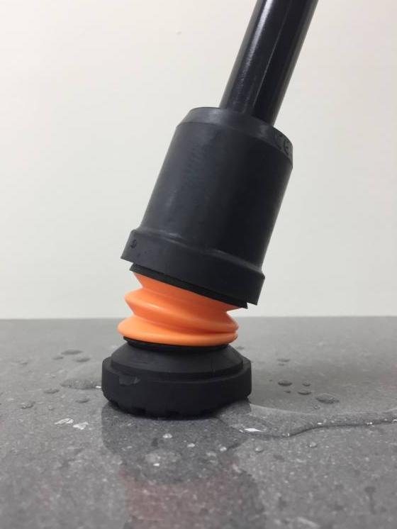 a black and orange object sitting on top of a table