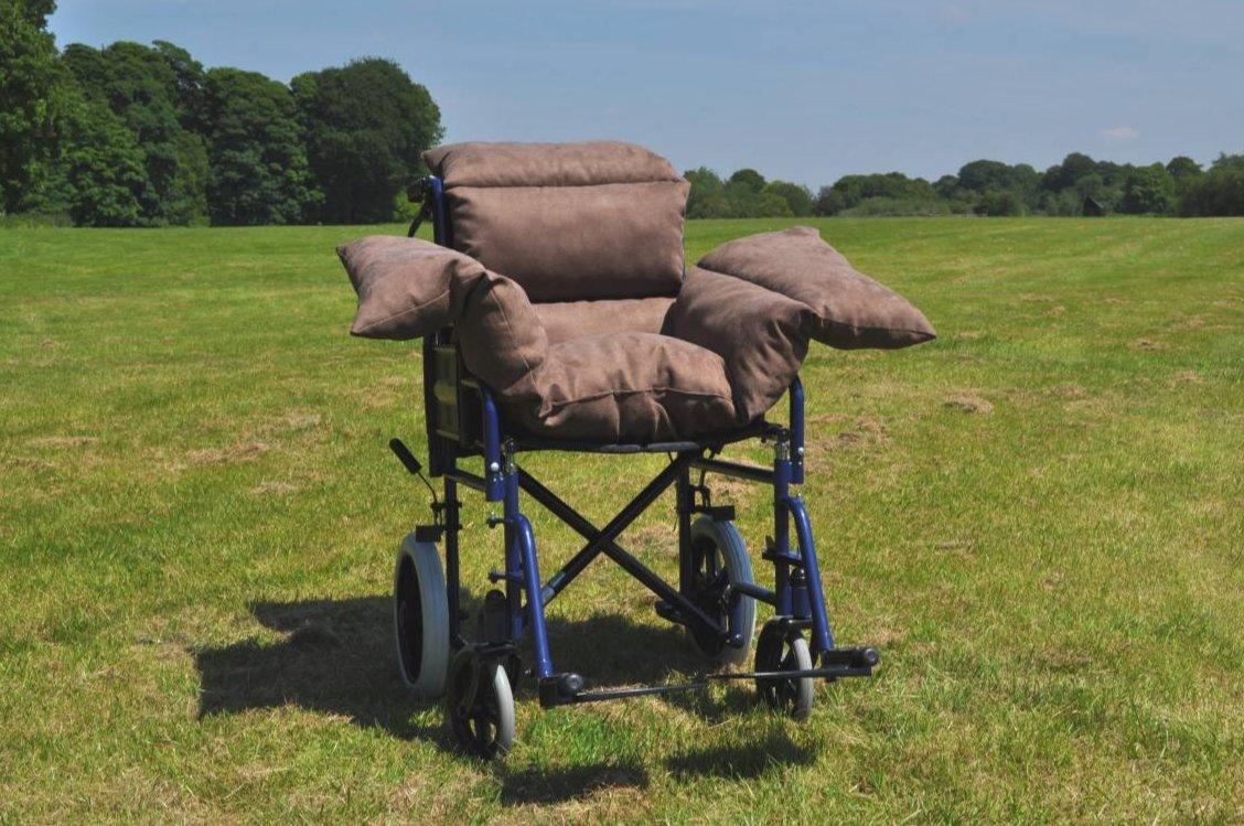a chair that is sitting in the grass