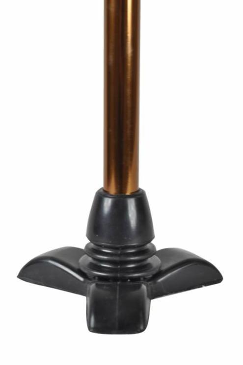 a black and gold table lamp on a white background