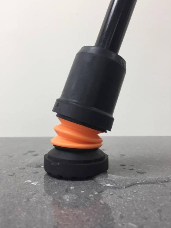 a black and orange object sitting on top of a table
