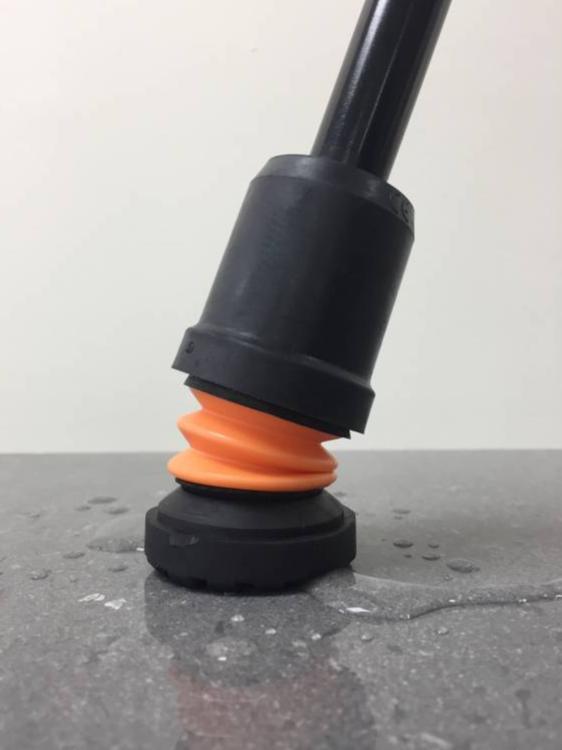 a black and orange object sitting on top of a table