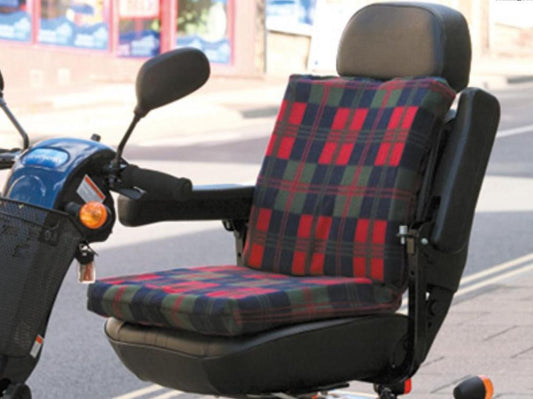 a scooter with a seat and a seat cover on it