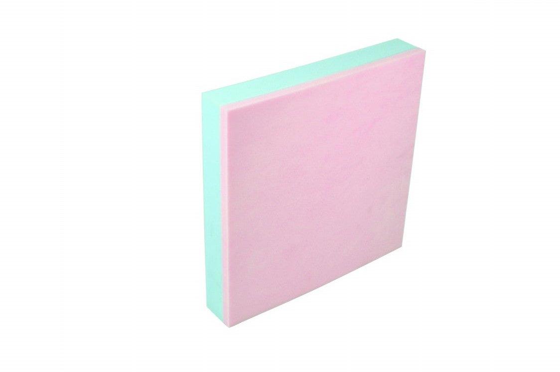 a pink and blue foam board on a white background